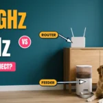 White Wi-Fi router on an oak sideboard next to a smart pet feeder with a golden retriever, against a teal wall, with 2.4GHz vs 5GHz title