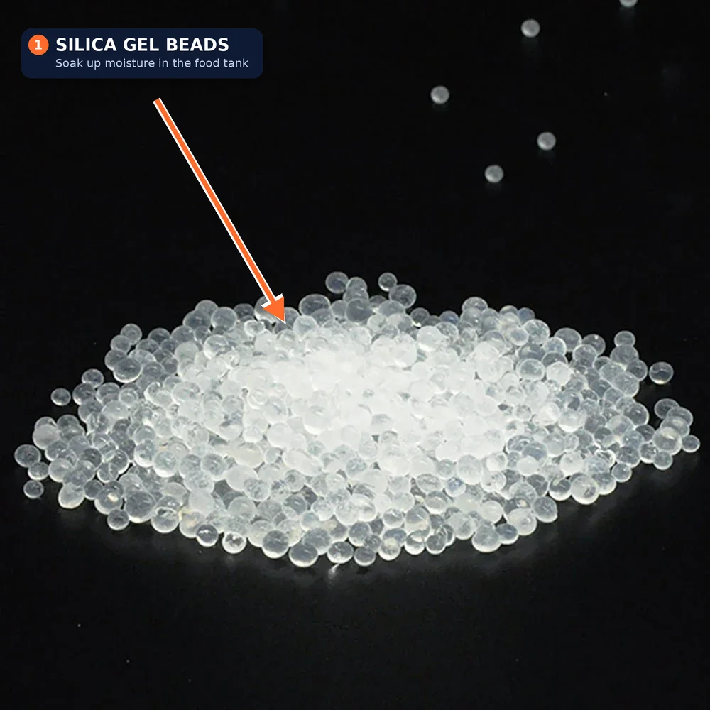 Pile of clear silica gel beads, labelled as the material that soaks up moisture in a pet feeder food tank